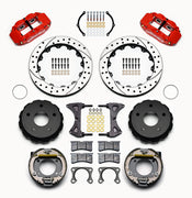 Wilwood Bronco 2.00-inch-offset rear Superlite brake kit laid out with red calipers, drilled and slotted rotors, internal parking-shoe assemblies and mounting parts