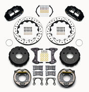 Wilwood Bronco 2.00-inch-offset rear Superlite brake kit laid out with black calipers, drilled and slotted rotors, internal parking-shoe assemblies and mounting parts