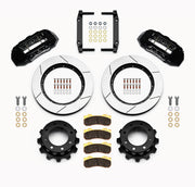 Wilwood Super Duty 4WD rear TX6R brake kit laid out with black calipers, slotted rotors and hats, pads and mounting brackets