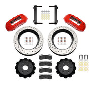 Wilwood red TX6R kit laid out with drilled-and-slotted rotor rings, separate hats, brake pads, brackets and hardware