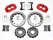 Wilwood red Superlite 6R kit laid out with drilled-and-slotted rotor rings, separate hats, brake pads, brackets and hardware