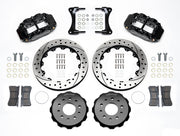 Wilwood black Superlite 6R kit laid out with drilled-and-slotted rotor rings, separate hats, brake pads, brackets and hardware