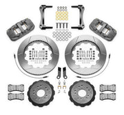 Wilwood gray AERO6 kit laid out with slotted rotor rings, separate hats, brake pads, brackets, braided hoses and hardware