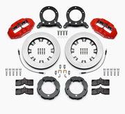 Wilwood red D8-4 kit laid out with plain-face rotor rings, separate hats, brake pads, brackets, braided hoses and hardware