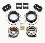Wilwood black low-profile rear calipers, drilled-and-slotted rotor-and-hat units, pads and internal parking-shoe assemblies laid out
