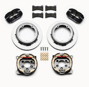 Wilwood black low-profile rear calipers, plain-face rotor-and-hat units, pads and internal parking-shoe assemblies laid out