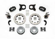 Wilwood black Dynalite/MC4 rear kit for modified GM 12-bolt axles with nonstaggered shocks, with 12.19-inch drilled-and-slotted rotors, hats, pads and brackets laid out