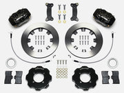 Wilwood black Dynalite kit laid out with plain-face rotor rings, separate hats, brake pads, brackets, braided hoses and hardware