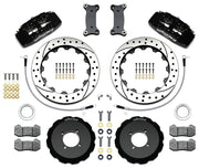Wilwood black Dynapro 6 kit laid out with drilled-and-slotted rotor rings, separate hats, brake pads, brackets, braided hoses and hardware