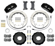 Wilwood black Dynapro 6 kit laid out with slotted rotor rings, separate hats, brake pads, brackets, braided hoses and hardware