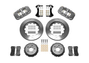 Wilwood gray AERO6 kit laid out with slotted rotor rings, separate hats, brake pads, brackets and hardware