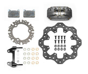 Wilwood Powerlite brake kit: One gray Powerlite four-piston caliper, scalloped drilled steel rotor, separate round adapter, pads and radial mounting bracket with fasteners; 11.75-inch front brake setup for Dirt Modified.