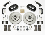 Wilwood Superlite 6R brake kit: Two black Superlite calipers, plain integral rotor/hub castings, pads, bearings, brackets and fasteners laid out; no flex hoses visible; 11.86-inch front brake setup for 1964–1970 Chevy/GMC 2WD.