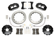 Wilwood Superlite 6R brake kit: Pair of black Superlite calipers, slotted rotors, separate dark hats, pads, braided hoses, fittings, brackets and fasteners in a flat layout; 12.88-inch front brake setup for Audi A4/S4/RS4/S5.