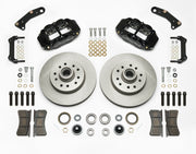 Wilwood Superlite 6R brake kit: Two black calipers, plain integral rotor/hub castings, pads, bearings, brackets and mounting fasteners arranged on white; 11.86-inch front brake setup for 1960–1963 Chevy/GMC 2WD.