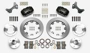 Wilwood Dynalite brake kit: Two black calipers, plain rotor rings, separate aluminum adapters and hubs, bearings, pads, spindle brackets and fasteners arranged as a kit layout; 12.19-inch front brake setup for ProSpindle 5 x 5.