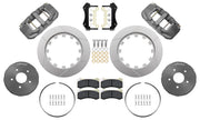 Wilwood AERO6 brake kit: Two gray anodized AERO6 calipers, slotted rotor rings, dark lug-drive hats, retaining rings, pads, mounting brackets and fasteners arranged on white; 14-inch front brake setup for Corvette/XLR/Hub Spindle.