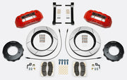 Wilwood TX6R brake kit: Two red TX6R calipers, slotted rotor rings, separate dark eight-hole hats, pads, hoses, fittings, brackets and fasteners in a kit layout; 15-inch front brake setup for F-250/F-350 4WD SRW.