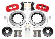 Wilwood AERO6 brake kit: Pair of red AERO6 calipers, drilled-and-slotted rotor rings, separate black hats, pads, braided hoses, fittings, brackets and fasteners in a flat parts layout; 15-inch front brake setup for Audi A4/A5/S4/S5.