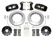 Wilwood AERO6 brake kit: Pair of black AERO6 calipers, slotted rotor rings, separate black hats, pads, braided hoses, fittings, brackets and fasteners in a flat parts layout; 15-inch front brake setup for Audi A4/A5/S4/S5.