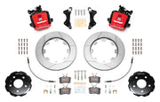 Wilwood CPB brake kit: Two red combination parking-brake calipers with visible actuating mechanisms, slotted rotors, separate hats, pads, hoses, brackets and fasteners; 12.19-inch rear brake setup for Audi A4/S4/RS4/S5.