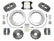 Wilwood AERO6-ST brake kit: Pair of gray anodized AERO6 calipers, slotted rotors, separate dark hats, pads, braided hoses, brackets and fasteners arranged as a parts layout; 14-inch front brake setup for 370Z/G35/G37.