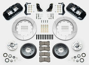 Wilwood AERO6 brake kit: Two black calipers, slotted rotor rings, deep dark hats, separate aluminum hubs, bearings, pads, mounting brackets, wheel studs and fasteners in a layout; 14-inch front brake setup for 1957–1967 F-100.