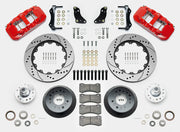 Wilwood F-100 AERO6 drum-spindle front kit layout with red AERO6 calipers, 14.00-inch drilled-and-slotted rotors, aluminum hats, separate hubs, pads, bearings and mounting hardware