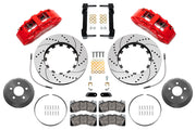 Wilwood Mustang or Ridetech hub-spindle 15-inch front kit layout with red SX6R calipers, 15.00-inch drilled-and-slotted rotors, lug-drive hats, retaining rings, pads and brackets