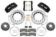 Wilwood Mustang or Ridetech hub-spindle 15-inch front kit layout with black SX6R calipers, 15.00-inch drilled-and-slotted rotors, lug-drive hats, retaining rings, pads and brackets