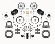 Wilwood MG TD/TF five-lug front kit layout with black Forged Dynalite-M calipers, 10.75-inch plain-face rotors, aluminum hubs, rotor adapter plates, pads, bearings and mounting parts, included wheel spacers