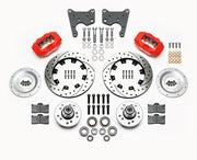 Wilwood C-body 12.19-inch Dynalite front kit layout with red Forged Dynalite Internal calipers, 12.19-inch drilled-and-slotted rotors, aluminum hubs, rotor adapter plates, pads, bearings and mounting parts