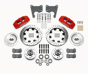 Wilwood C-body six-piston Dynapro front kit layout with red Dynapro 6 calipers, 12.19-inch drilled-and-slotted rotors, aluminum hubs, rotor adapter plates, pads, bearings and mounting parts