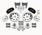Wilwood C-body six-piston Dynapro front kit layout with black Dynapro 6 calipers, 12.19-inch drilled-and-slotted rotors, aluminum hubs, rotor adapter plates, pads, bearings and mounting parts