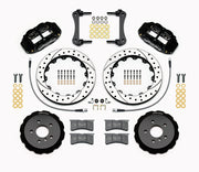 Wilwood five-lug Mini front kit layout with black Superlite 6R calipers, 12.88-inch drilled-and-slotted rotors, aluminum hats, pads and mounting brackets