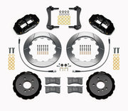 Wilwood five-lug Mini front kit layout with black Superlite 6R calipers, 12.88-inch GT-slotted rotors, aluminum hats, pads and mounting brackets