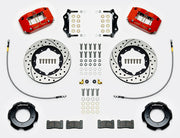 Wilwood red Series I Jaguar front kit laid out with drilled-and-slotted rotor rings, separate hats, braided hoses, calipers, pads and mounting brackets