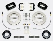 Wilwood black Series I Jaguar front kit laid out with plain-face rotor rings, separate hats, braided hoses, calipers, pads and mounting brackets