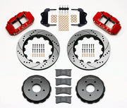Wilwood red Pontiac GTO front kit laid out with drilled-and-slotted rotor rings, separate hats, calipers, pads and mounting brackets
