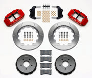 Wilwood red Pontiac GTO front kit laid out with slotted rotor rings, separate hats, calipers, pads and mounting brackets