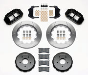 Wilwood black Pontiac GTO front kit laid out with slotted rotor rings, separate hats, calipers, pads and mounting brackets