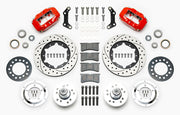 Wilwood red later Mopar 11-inch front kit laid out with drilled-and-slotted rotor rings, aluminum hubs, rotor adapters, bearings, seals, pads and brackets