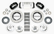 Wilwood black later Mopar 11-inch front kit laid out with drilled-and-slotted rotor rings, aluminum hubs, rotor adapters, bearings, seals, pads and brackets