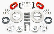Wilwood red later Mopar 11-inch front kit laid out with plain-face rotor rings, aluminum hubs, rotor adapters, bearings, seals, pads and brackets