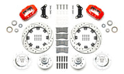 Wilwood red later Mopar 12.19-inch front kit laid out with drilled-and-slotted rotor rings, aluminum hubs, rotor adapters, bearings, seals, pads and brackets