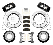 Wilwood black Toyota/Lexus front kit laid out with slotted rotor rings, separate hats, braided hoses, calipers, pads and mounting brackets