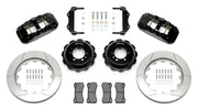 Wilwood black Superformance GT40 rear kit laid out with slotted rotor rings, separate hats, calipers, pads and mounting brackets