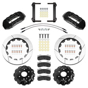 Wilwood black GM 1500 truck/full-size SUV front kit laid out with slotted rotor rings, separate hats, braided hoses, calipers, pads and mounting brackets