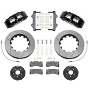 Wilwood SX6R front brake kit, Corvette C7, 15-inch GT rotors: Parts layout with two black SX6R calipers, gt slotted rotor rings, separate black hats, pads, brackets and fasteners.