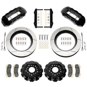 Wilwood TX6R front brake kit, Ram 1500 RWD, 16-inch GT rotors: Parts layout with two black TX6R calipers, gt slotted rotor rings, separate black hats, pads, brackets and fasteners.